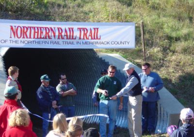 Craig Mayo cuts the ribbon to officially open this 1.7 mile of walking trail.